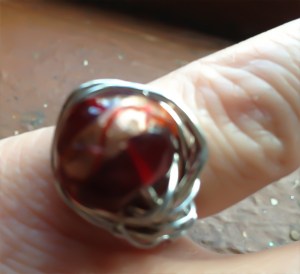 A ring gorgeous crimson red and gold glass bead wrapped in silver - inspired by the fallen leaves