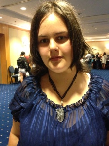 Caroline - wearing my dragon wrapped to a stunning crystal point necklace