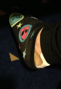 My scary alien sock foot.  Airport muggers wear alien socks and only display their left foot.  It's a fact.
